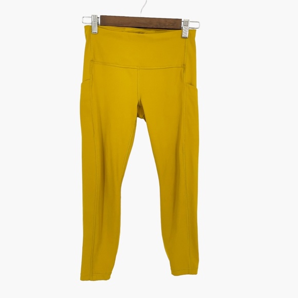 ATHLETA Ultimate Stash Pocket 7/8 Tight‎ in Oxidized Yellow - Picture 1 of 6